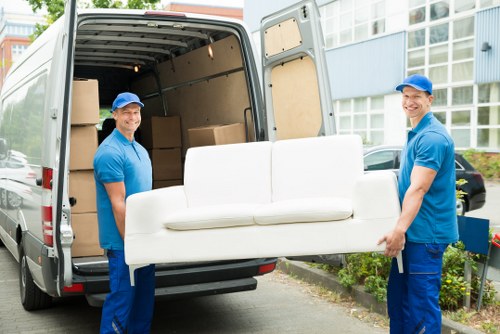 Removal team packing household items in Kingston upon Thames