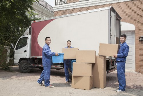 Removal van and packed boxes during a local house move in Kingston Upon Thames