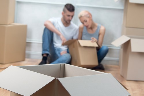 Local movers handling furniture in a Kingston street with access considerations