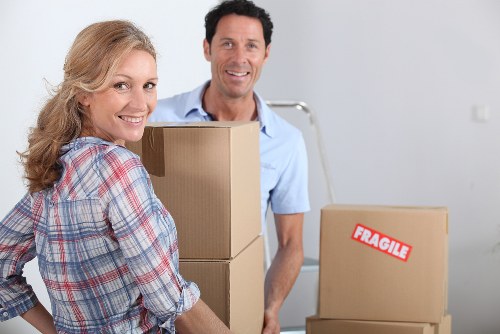 Staff wearing PPE during a house move
